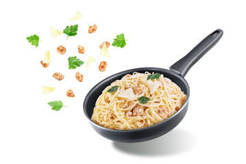 Minced turkey parsley pasta in a black pan on a white isolated background
