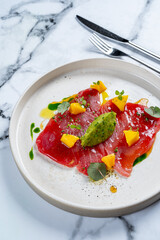 red fish on a plate, pesto, dish