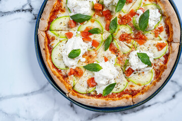 pizza with stracciatella on a white background