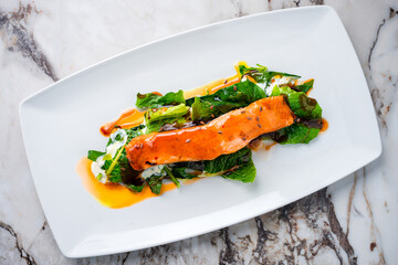 Roasted salmon steak with spinach Healthy meal