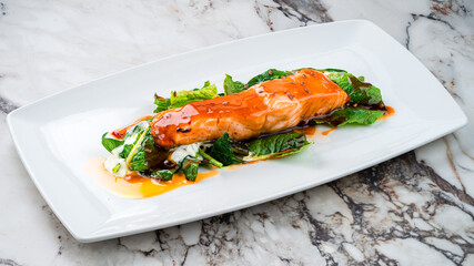 Roasted salmon steak with spinach Healthy meal