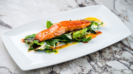 Roasted salmon steak with spinach Healthy meal