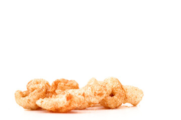 pile of pork rinds isolated on white 