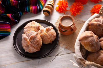 Pan de Muerto. Typical Mexican sweet bread that is consumed in the season of the day of the dead. It is a main element in the altars and offerings in the festivity of the day of the dead.