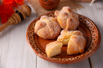 Pan de Muerto. Typical Mexican sweet bread that is consumed in the season of the day of the dead. It is a main element in the altars and offerings in the festivity of the day of the dead.