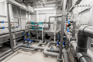 industrial water treatment. Plastic and metal pipes with fittings, valves