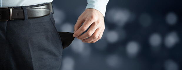 Man showing empty pocket