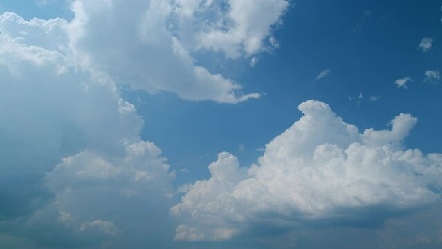 Summer cumulonimbus clouds. White clouds nature cloudscape background. Beautiful cumulonimbus cloud moving. Timelapse.
