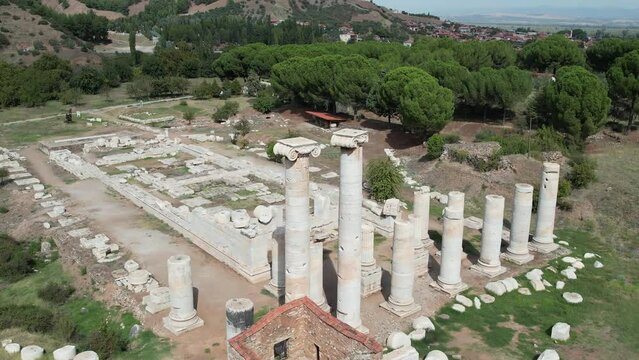 Aerial view with drone; Sardes (Sardis) Ancient City which has gymnasium and synagogue ruins and columns in Manisa, Turkey.