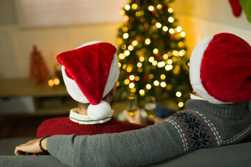 Gay couple in love sharing a romantic christmas moment