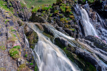 Fototapeta na wymiar Welcombe Mouth waterfall in the Hartland peninsula, North Devon