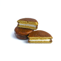 Delicious choco pies with marshmallow on white background. Classic snack cakes