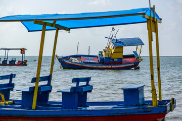 Fototapeta na wymiar Beach. Sao Miguel dos Milagres, Alagoas, Brazil. Small boats at Toque Beach on February 13, 2022.