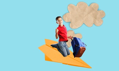 Creative child on paper plane and colored background