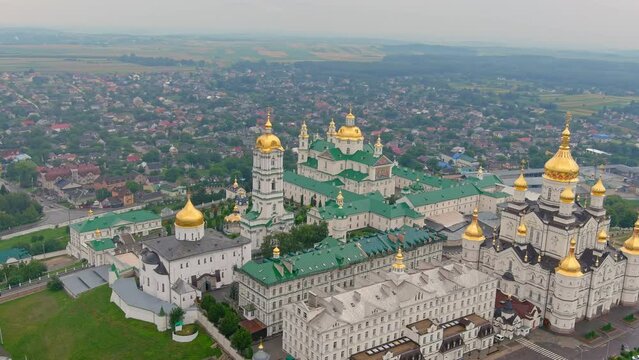 Aerial view of Pochaev Monastery, Orthodox Church, Pochayiv Lavra at day, Ukraine. Pochayiv Lavra in morning. View from the hills