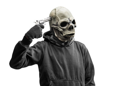 Man with a skull head costume for Halloween holding gun