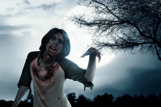 Scary zombie with blood and wound on his body