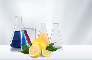 Fresh ripe lemon and glass tubes equipment