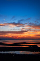Fototapeta na wymiar 大分県の国東半島にある豊後高田市の真玉海岸に沈む美しい夕日