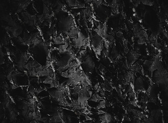 Black texture. Stone background. Dark marble. Rock texture. Rock surface with cracks. Rock pile. Paint spots wall. Grunge Rough structure. Abstract texture.
