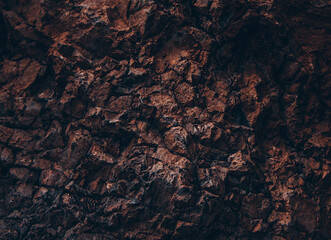 Brown texture. Stone background. Rock texture. Grunge Rough structure. Abstract texture. Rock surface with cracks. Rock pile. Paint spots wall. Wall marble.