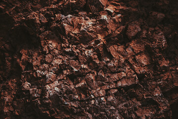 Brown texture. Stone background. Rock texture. Grunge Rough structure. Abstract texture. Rock surface with cracks. Rock pile. Paint spots wall. Wall marble.
