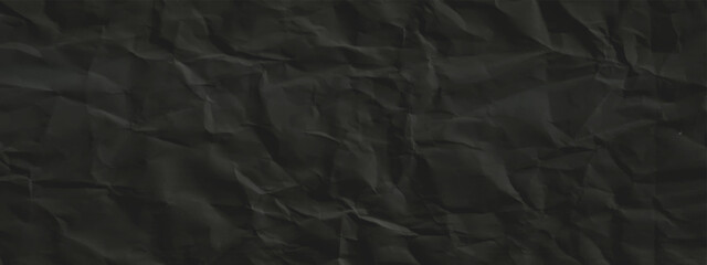 Fototapeta premium crumpled paper background in black color with panorama top view