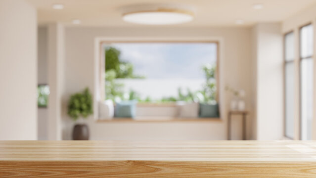 Empty wooden table with blurred view of scandinavian living room.