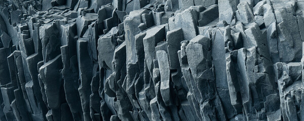 Gray rock banner. Abstract stone background. Textured basalt stone wall. Close-up. Light gray rock backdrop.