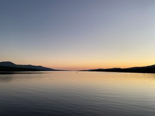 Kenmare bay at sunset viewed from Kenmare pier, Kerry, Ireland.