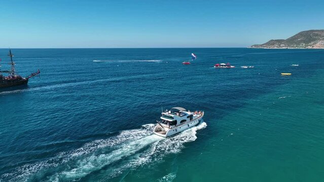 A large luxury yacht sails at sea aerial view 4 K