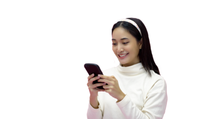 Asian woman smiling and using mobile phone with tablet and excited for online shopping on isolated pink background.