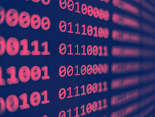Closeup view of binary computer code with pink 1s and 0s displayed on a blue screen with focus blur...