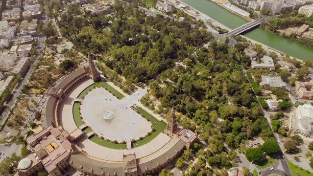 Aerial view of Plaza de Espana. Spanish Square. Seville, Spain. Maria Luisa Park. Cinematic 4K