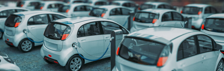 Charging modern electric cars from station outdoors.