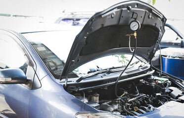 Car fuel system service  ,check fuel pressure by using a fuel pressure gauge tester. 
