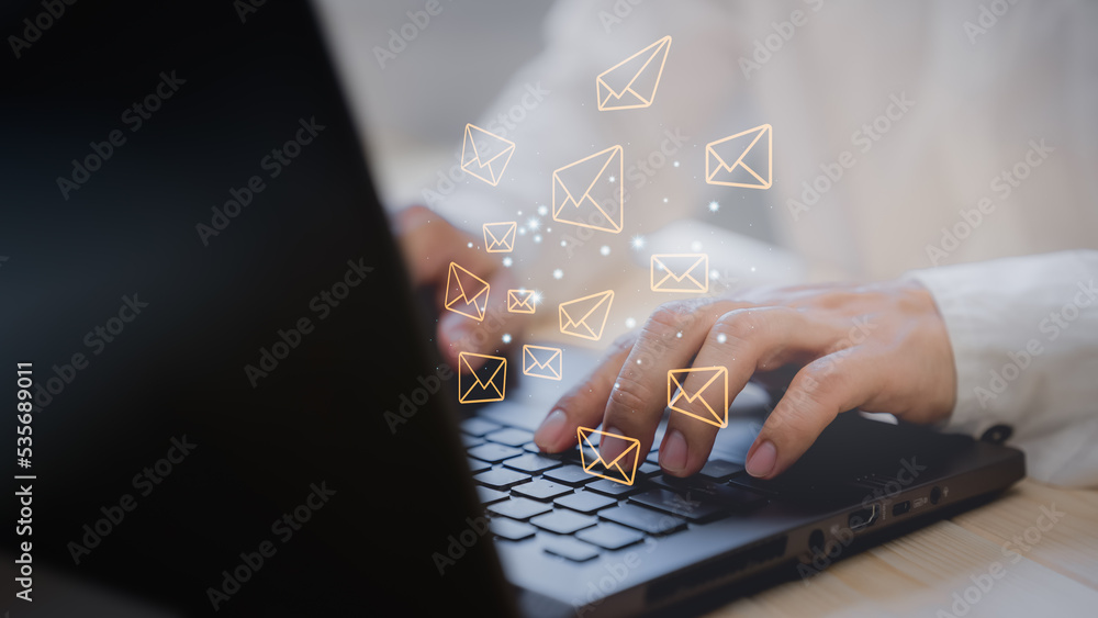 Leinwandbilder email marketing and newsletters, technology and lifestyle concepts. man's hand using computer laptop