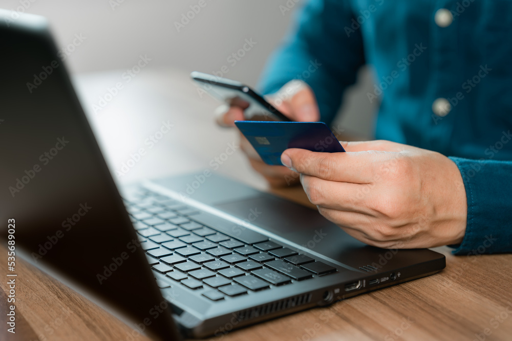 Poster Man using credit card for purchasing and shopping online on mobile phone. Mobile payment with wallet app technology. Digital money transfer, banking and e commerce concept.