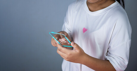 People's fingers are pressing on the phone screen fingerprint scanner. Represents protection...