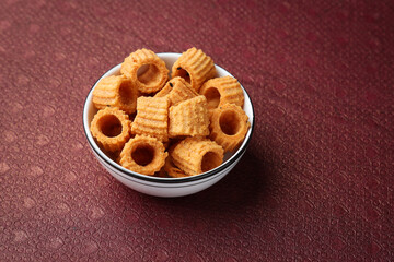 Indian traditional tea time fried snack Chakli or Murukku. Popular food in India for festivals like Pongal Diwali Deepawali Tamil nadu Kerala.