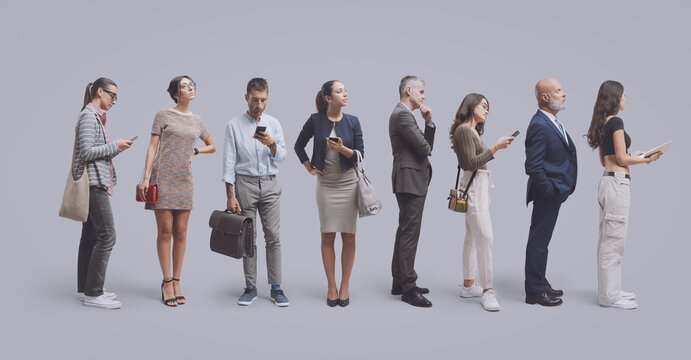 Diverse people waiting patiently in line