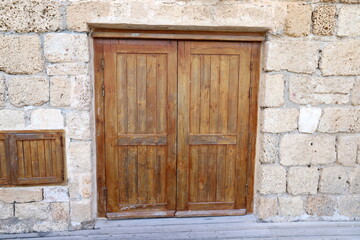 City entrance doors to a building in a big city in Israel.