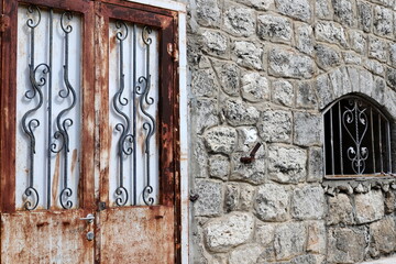 City entrance doors to a building in a big city in Israel.