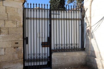 City entrance doors to a building in a big city in Israel.