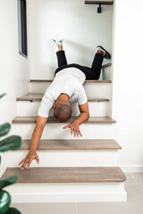 A young man faints and collapses on the stairs of the house. He was injured in an accident and fell...