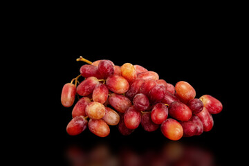 The grapes on a black background.