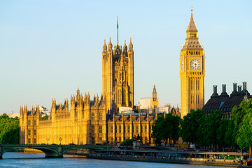 Big Ben and Westminster bridge in morning light in London. England