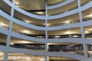 The illuminated driveway of a multi-storey car park