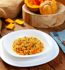Delicious pumpkin risotto with parmesan cheese