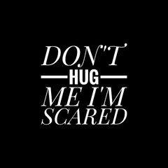 dont hug me im scared writing with black background